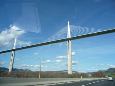 Driving under the Millau bridge , Monaco Historic Grand Prix 2018 tour