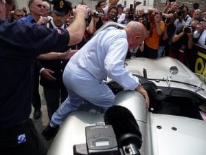 Stirling Moss at the 2009 Mille Miglia, Brescia.Join us on our 2018 Mille Miglia tour