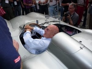 Stirling Moss at the 2009 Mille Miglia, Brescia.Join us on our 2018 Mille Miglia tour